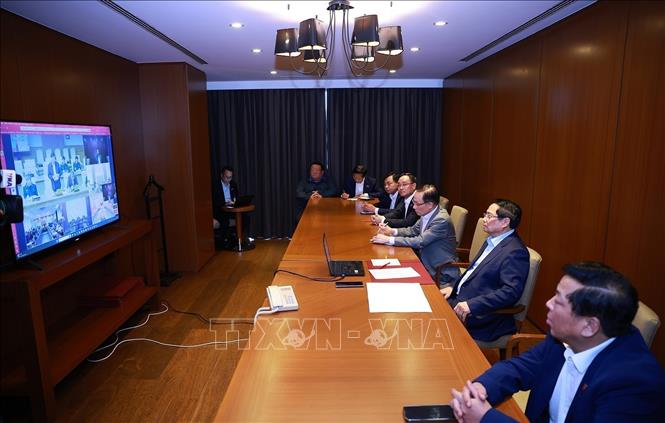 Prime Minister Pham Minh Chinh chairs the online meeting. VNA Photo: Dương Giang