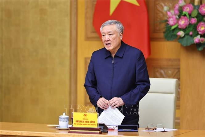 Phó Thủ tướng thường trực Nguyễn Hòa Bình dự tại điểm cầu trụ sở Chính phủ. Ảnh: Minh Đức – TTXVN