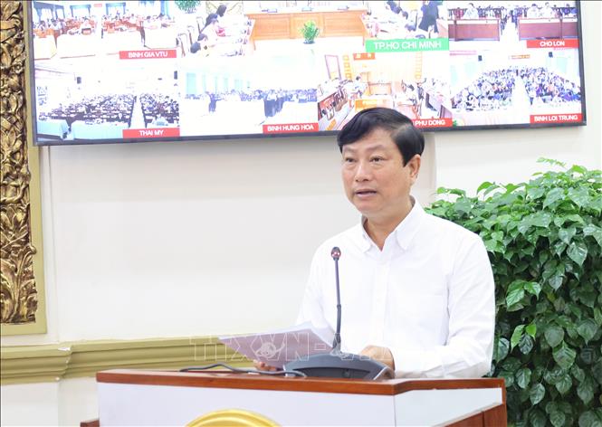 Ông Võ Văn Minh, Chủ tịch HĐND TP. Hồ Chí Minh, Chủ tịch Ủy ban Bầu cử Thành phố, phát biểu kết luận Hội nghị. Ảnh: Hữu Duyên - TTXVN