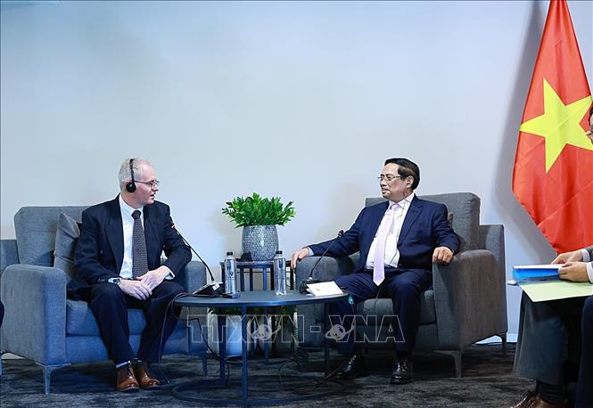 Thủ tướng Phạm Minh Chính tiếp ông Neil Pollock, Phó Chủ tịch Phòng Thương mại và Công nghiệp Nam Phi. Ảnh: Dương Giang-TTXVN