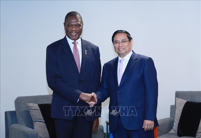 Thủ tướng Phạm Minh Chính gặp Phó Tổng thống Nam Phi Paul Mashatile. Ảnh: Dương Giang-TTXVN