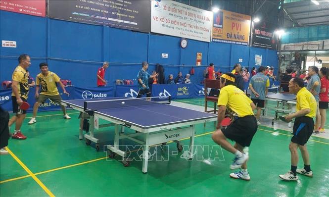 Các vận động viên tranh tài môn bóng bàn tại Giải. Ảnh: Trần Lê Lâm - TTXVN 