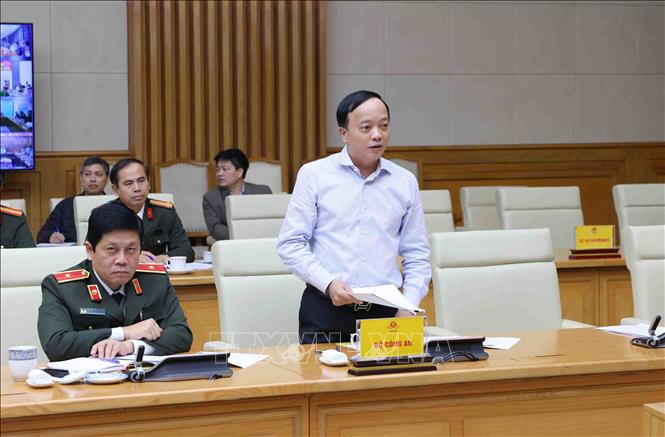 Trung tướng Đặng Hồng Đức, Thứ trưởng Bộ Công an phát biểu tại điểm cầu trụ sở Chính phủ. Ảnh: Phạm Kiên - TTXVN 