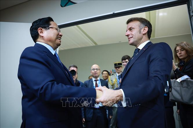 Thủ tướng Phạm Minh Chính gặp Tổng thống Pháp Emmanuel Macron. Ảnh: Dương Giang-TTXVN 
