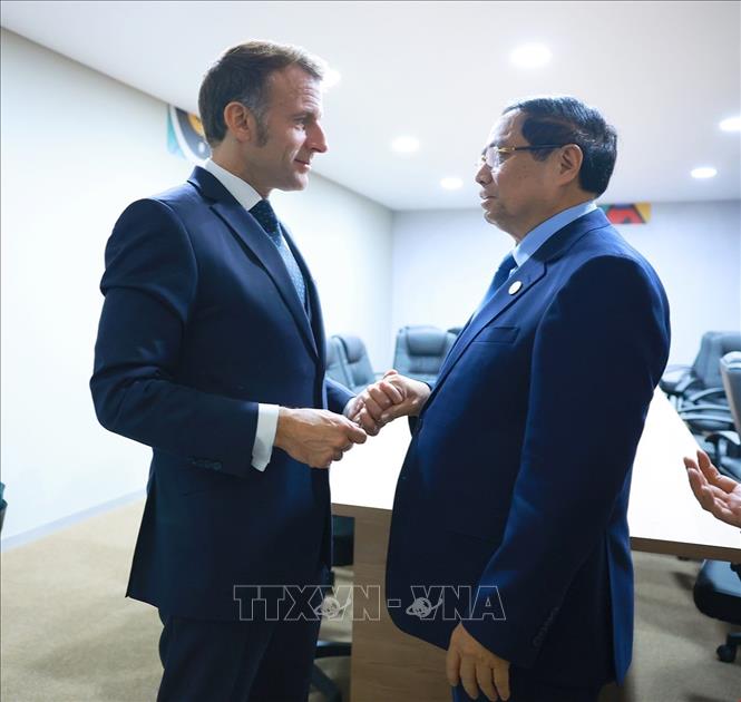 Thủ tướng Phạm Minh Chính gặp Tổng thống Pháp Emmanuel Macron. Ảnh: Dương Giang-TTXVN 