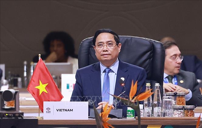 Thủ tướng Phạm Minh Chính phát biểu tại Phiên thảo luận III Hội nghị Thượng đỉnh G20. Ảnh: Dương Giang-TTXVN 
