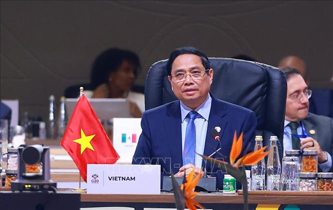 Thủ tướng Phạm Minh Chính phát biểu tại Phiên thảo luận III Hội nghị Thượng đỉnh G20. Ảnh: Dương Giang-TTXVN 
