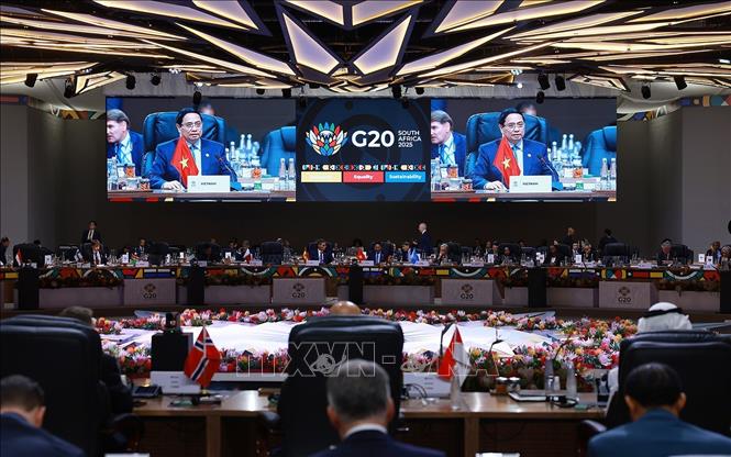 Thủ tướng Phạm Minh Chính phát biểu tại Phiên thảo luận III Hội nghị Thượng đỉnh G20. Ảnh: Dương Giang-TTXVN 
