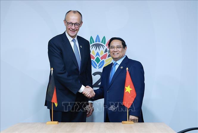 Vietnamese Prime Minister Pham Minh Chinh and German Chancellor Friedrich Merz. VNA Photo: Dương Giang