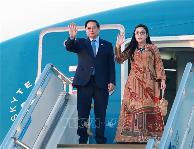 Thủ tướng Phạm Minh Chính và Phu nhân kết thúc chuyến tham dự Hội nghị Thượng đỉnh G20 tại Nam Phi. Ảnh: Dương Giang-TTXVN
