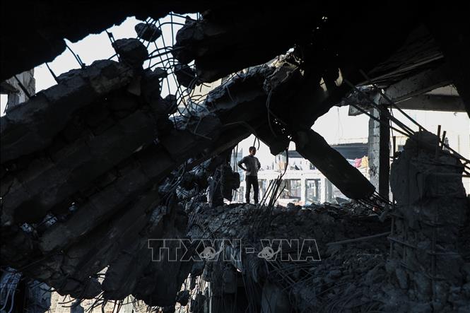 Những ngôi nhà bị phá hủy sau cuộc không kích của Israel tại Gaza. Ảnh: THX/TTXVN