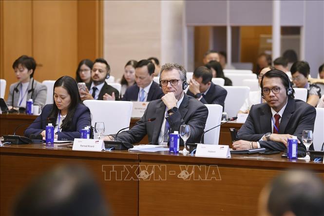 Đại biểu dự cuộc làm việc. Ảnh: Doãn Tấn - TTXVN 