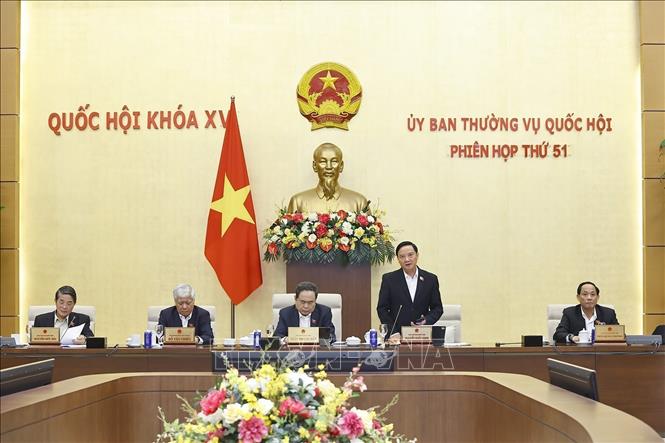 The National Assembly Standing Committee review draft resolutions that amend and supplement special incentives for Ho Chi Minh City and Da Nang. VNA Photo: Doãn Tấn