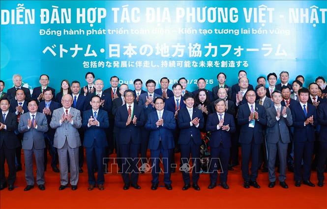 Thủ tướng Phạm Minh Chính và các đại biểu tham dự Diễn đàn hợp tác địa phương Việt Nam-Nhật Bản. Ảnh: Dương Giang-TTXVN
