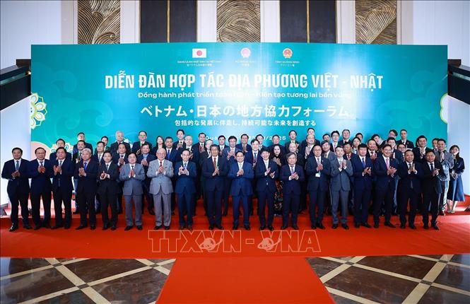Thủ tướng Phạm Minh Chính và các đại biểu tham dự Diễn đàn hợp tác địa phương Việt Nam-Nhật Bản. Ảnh: Dương Giang-TTXVN
