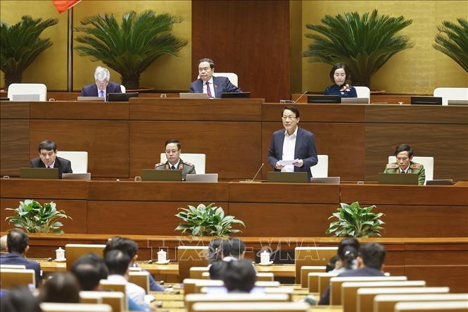 Bộ trưởng Bộ Công an Lương Tam Quang giải trình, làm rõ một số vấn đề đại biểu Quốc hội nêu. Ảnh: Doãn Tấn - TTXVN


