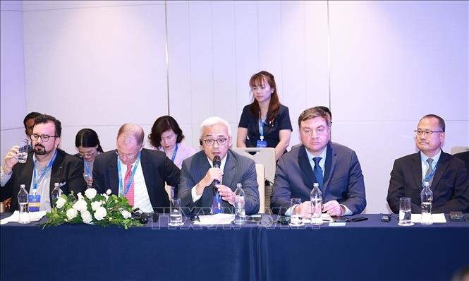 Đại diện lãnh đạo các doanh nghiệp quốc tế về lĩnh vực tài chính tham dự buổi tiếp. Ảnh: Dương Giang-TTXVN