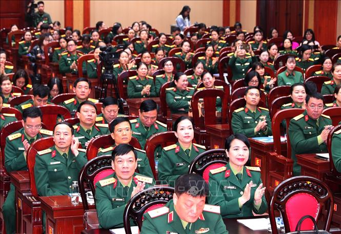 Các đại biểu dự buổi truyền thông hưởng ứng tháng hành động. Ảnh: Trọng Đức - TTXVN