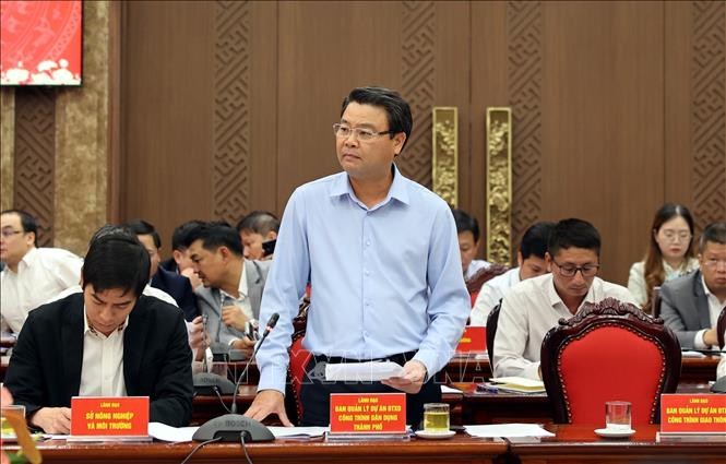 Đại diện Ban quản lý Dự án Đầu tư xây dựng công trình dân dụng thành phố Hà Nội phát biểu tại hội nghị. Ảnh Vũ Quang – TTXVN