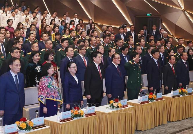 Chủ tịch nước Lương Cường và các đại biểu chào cờ hai nước. Ảnh: Lâm Khánh – TTXVN