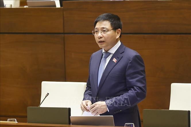 Bộ trưởng Bộ Tài chính Nguyễn Văn Thắng giải trình, làm rõ một số vấn đề đại biểu Quốc hội nêu. Ảnh: Doãn Tấn - TTXVN