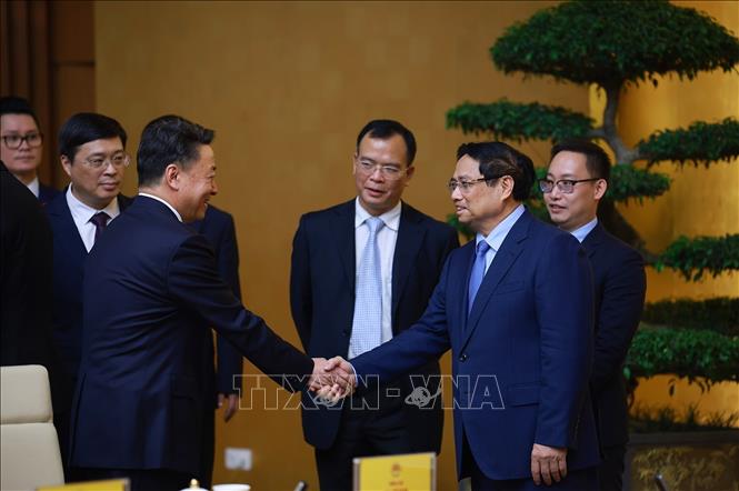 Thủ tướng Phạm Minh Chính tiếp ông Vi Thao, Chủ tịch Khu tự trị dân tộc Choang Quảng Tây và đoàn doanh nghiệp Trung Quốc sang thăm và làm việc tại Việt Nam. Ảnh: Dương Giang-TTXVN 