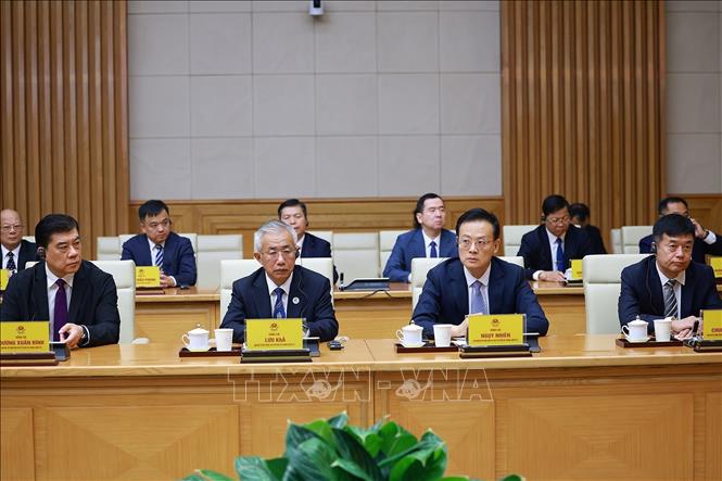 Đoàn doanh nghiệp Quảng Tây, Trung Quốc tham dự cuộc tiếp. Ảnh: Dương Giang-TTXVN
