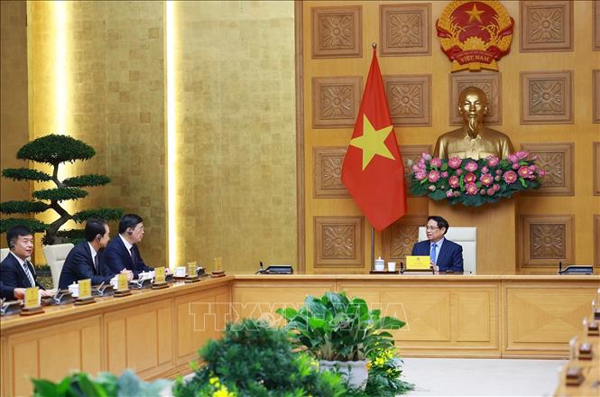 Thủ tướng Phạm Minh Chính tiếp ông Vi Thao, Chủ tịch Khu tự trị dân tộc Choang Quảng Tây, Trung Quốc và đoàn doanh nghiệp sang thăm và làm việc tại Việt Nam. Ảnh: Dương Giang-TTXVN
