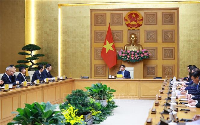 Thủ tướng Phạm Minh Chính tiếp ông Vi Thao, Chủ tịch Khu tự trị dân tộc Choang Quảng Tây, Trung Quốc và đoàn doanh nghiệp sang thăm và làm việc tại Việt Nam. Ảnh: Dương Giang-TTXVN
