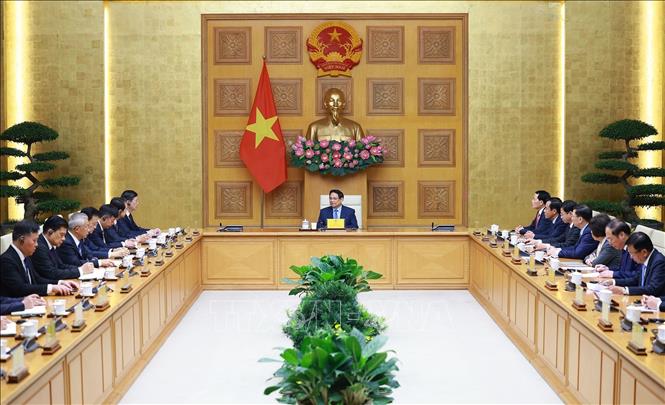 Thủ tướng Phạm Minh Chính tiếp ông Vi Thao, Chủ tịch Khu tự trị dân tộc Choang Quảng Tây, Trung Quốc và đoàn doanh nghiệp sang thăm và làm việc tại Việt Nam. Ảnh: Dương Giang-TTXVN
