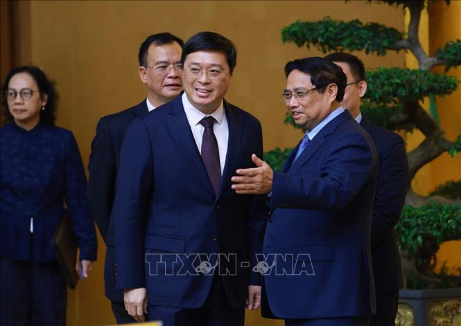 Thủ tướng Phạm Minh Chính tiếp ông Vi Thao, Chủ tịch Khu tự trị dân tộc Choang Quảng Tây, Trung Quốc. Ảnh: Dương Giang-TTXVN 