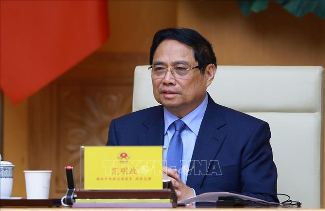 Thủ tướng Phạm Minh Chính phát biểu tại cuộc tiếp ông Vi Thao, Chủ tịch Khu tự trị dân tộc Choang Quảng Tây, Trung Quốc và đoàn doanh nghiệp sang thăm và làm việc tại Việt Nam. Ảnh: Dương Giang-TTXVN
