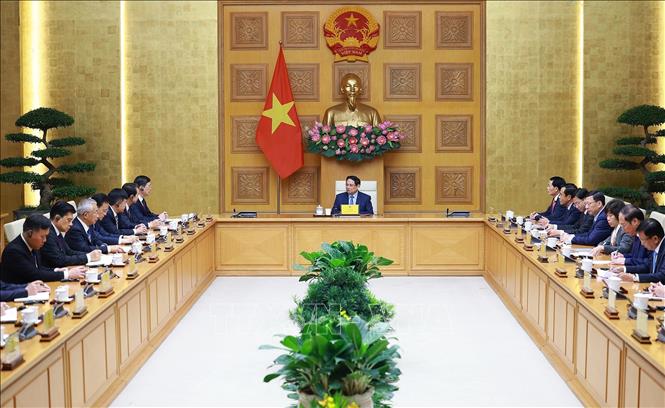 Thủ tướng Phạm Minh Chính tiếp ông Vi Thao, Chủ tịch Khu tự trị dân tộc Choang Quảng Tây, Trung Quốc. Ảnh: Dương Giang-TTXVN
