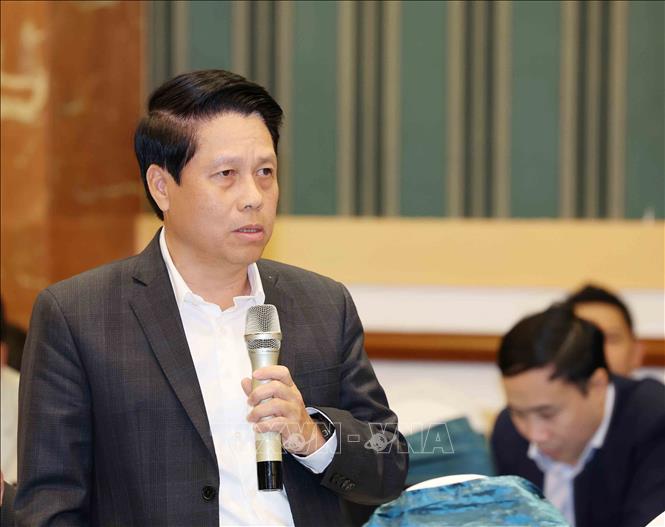 Phó Thống đốc Ngân hàng Nhà nước Việt Nam Phạm Tiến Dũng trình bày tham luận tại hội thảo. Ảnh: Phương Hoa – TTXVN