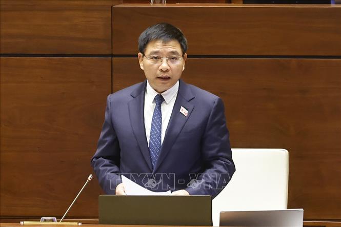 Bộ trưởng Bộ Tài chính Nguyễn Văn Thắng giải trình, làm rõ một số vấn đề đại biểu Quốc hội nêu. Ảnh: Doãn Tấn - TTXVN