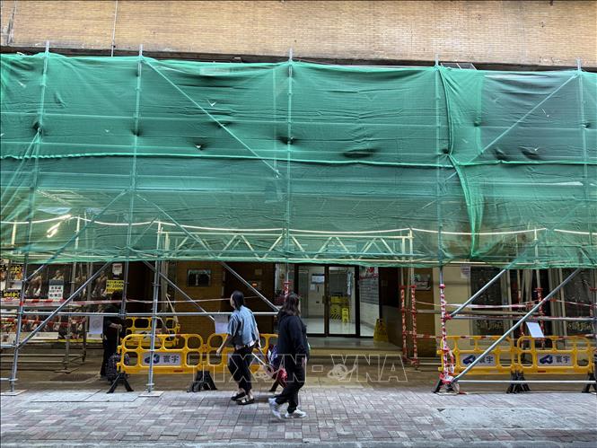 Giàn giáo tre được sử dụng trong sửa chữa, bảo dưỡng các tòa nhà. Ảnh: Mạc Luyện - PV TTXVN tại Hong Kong, Trung Quốc