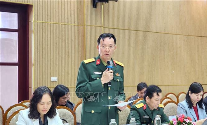 Đại tá Vũ Thành Minh, Phó Cục trưởng Cục Dân vận (Bộ Quốc phòng) phát biểu tại Hội nghị. Ảnh: Chu Thanh Vân - TTXVN