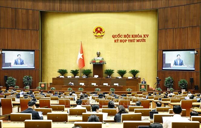 Bộ trưởng Bộ Xây dựng Trần Hồng Minh giải trình, làm rõ một số vấn đề đại biểu Quốc hội nêu. Ảnh: Doãn Tấn - TTXVN