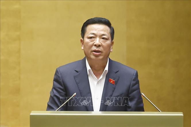 Bộ trưởng Bộ Xây dựng Trần Hồng Minh giải trình, làm rõ một số vấn đề đại biểu Quốc hội nêu. Ảnh: Doãn Tấn - TTXVN