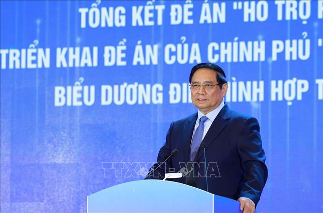 Prime Minister Pham Minh Chinh attends the conference reviewing the project supporting Women’s Startups and commending outstanding cooperatives managed by women in 2025. Photo: Duong Giang – VNA