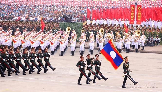 Khối Quân đội nhân dân Lào tham gia diễu binh tại Lễ kỷ niệm, diễu binh, diễu hành 80 năm Cách mạng tháng Tám thành công và Quốc khánh nước CHXHCN Việt Nam (2/9/1945 - 2/9/2025) được tổ chức trọng thể tại Quảng trường Ba Đình và một số tuyến phố trung tâm của Thủ đô Hà Nội. Ảnh: TTXVN. 
