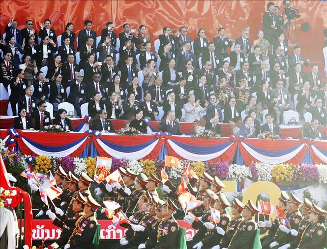 Tổng Bí thư Tô Lâm và Phu nhân cùng các đại biểu dự Lễ kỷ niệm 50 năm Quốc khánh CHDCND Lào. Ảnh: Thống Nhất - TTXVN
