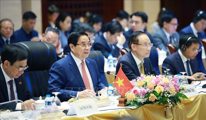 Thủ tướng Phạm Minh Chính phát biểu tại Kỳ họp lần thứ 48 Ủy ban liên Chính phủ về hợp tác song phương Việt Nam - Lào. Ảnh: Dương Giang-TTXVN
