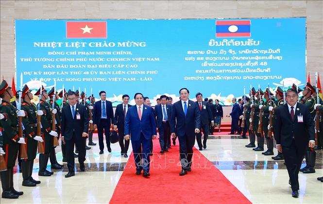 Thủ tướng Phạm Minh Chính và Thủ tướng Lào Sonexay Siphandone đồng chủ trì Kỳ họp lần thứ 48 Ủy ban liên Chính phủ về hợp tác song phương Việt Nam - Lào. Ảnh: Dương Giang-TTXVN
