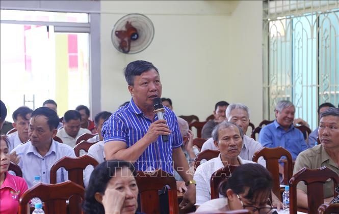 Một người dân tại xã Bình Minh, tỉnh Đồng Nai trình bày thắc mắc tại buổi đối thoại. Ảnh: Lê Xuân-TTXVN