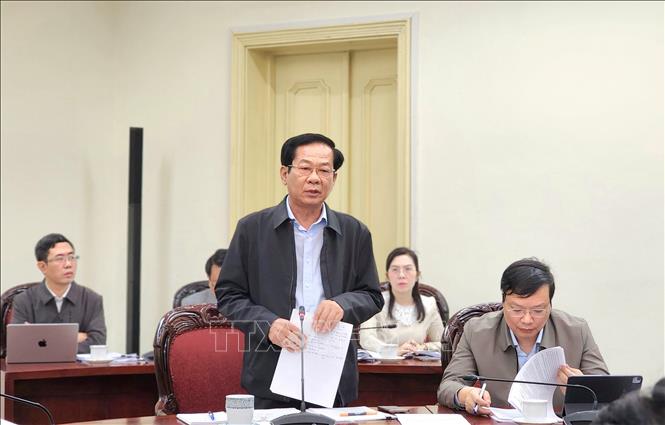 Bộ trưởng Bộ Nội vụ Đỗ Thanh Bình báo cáo tại cuộc họp. Ảnh: Chu Thanh Vân - TTXVN 