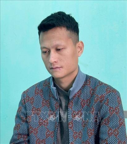 Đối tượng Mai Văn Tới cầm đầu đường dây lừa đảo. Ảnh: TTXVN phát