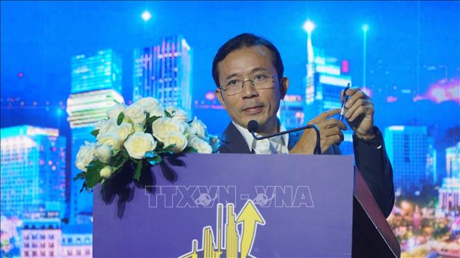 Ông Trần Xuân Toàn, Phó Tổng Biên tập Báo Tuổi trẻ phát biểu khai mạc hội thảo. Ảnh: Hương Giang - TTXVN                      