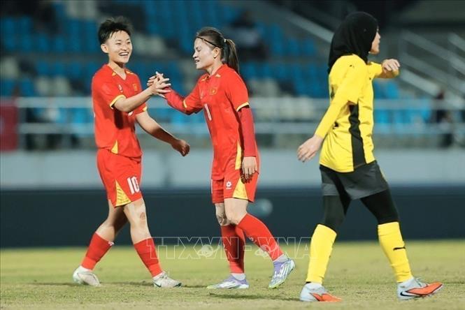 Thai Thi Thao (11) makes a hat-trick in the match. VNA Photo: Minh Quyết 