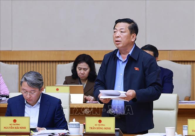 Bộ trưởng Bộ Xây dựng Trần Hồng Minh phát biểu. Ảnh: Dương Giang-TTXVN 
